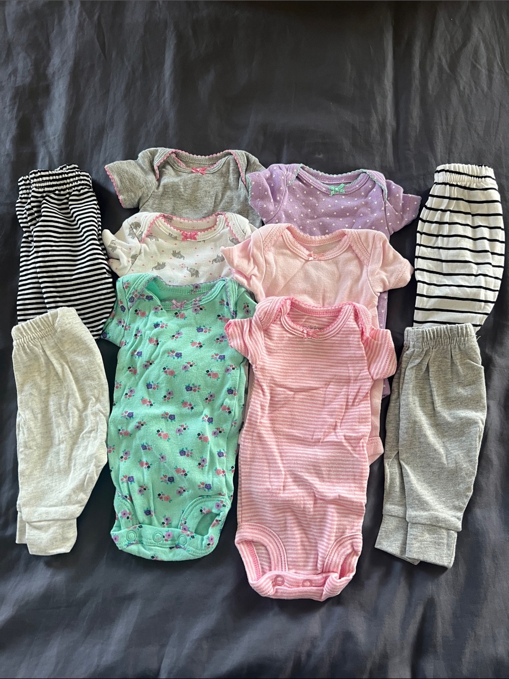 Bundle of baby girl short sleeve onesies and pants size preemie
